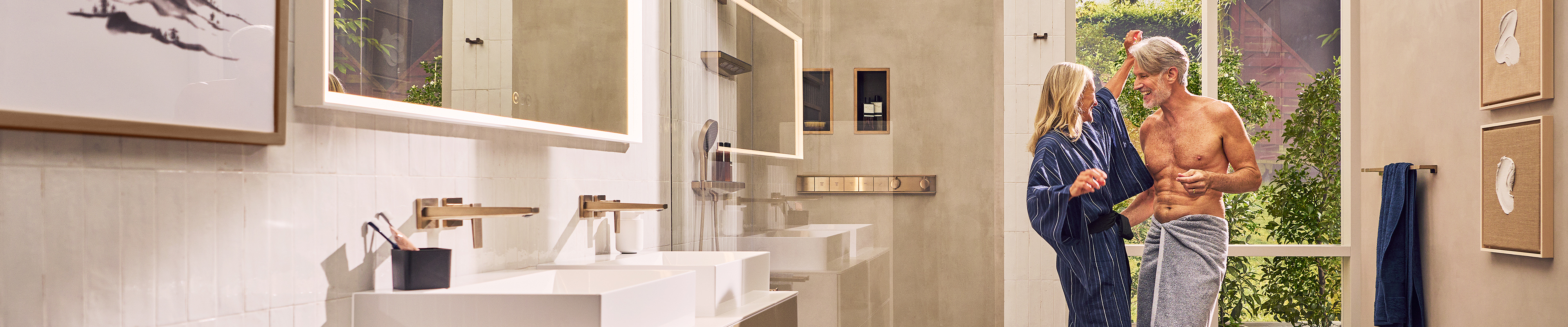 Couple in the holistic hansgrohe premium dream bathroom.