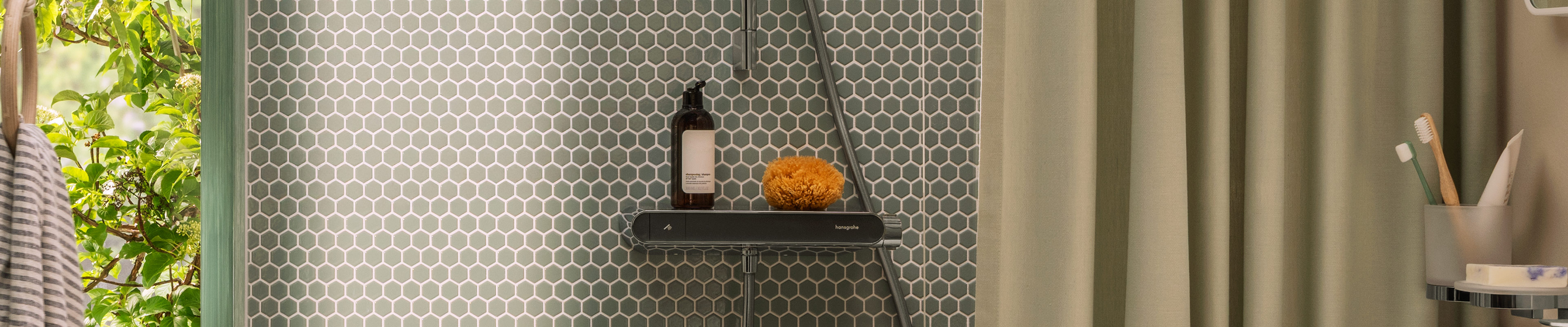 hansgrohe ShowerTablet Select 360 with integrated shelf.