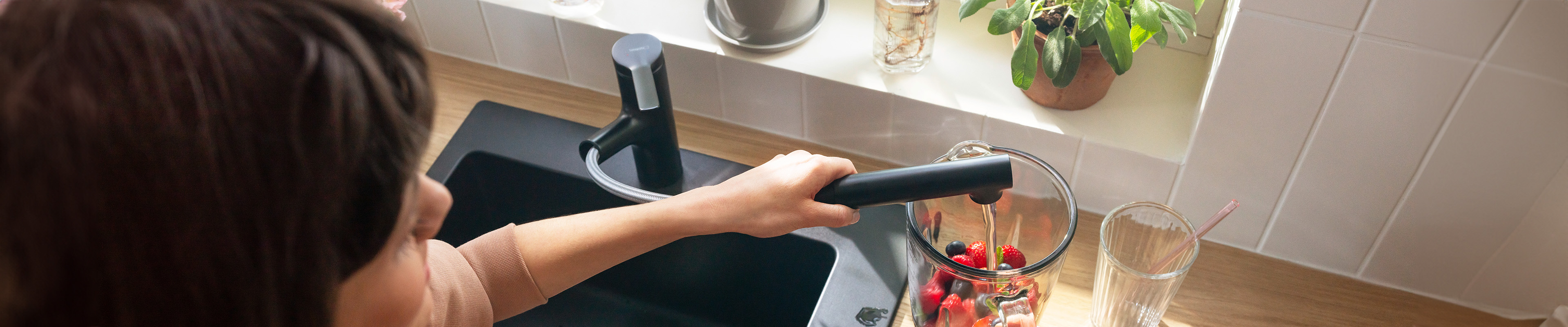 Modern hansgrohe kitchen products: sink and faucet.