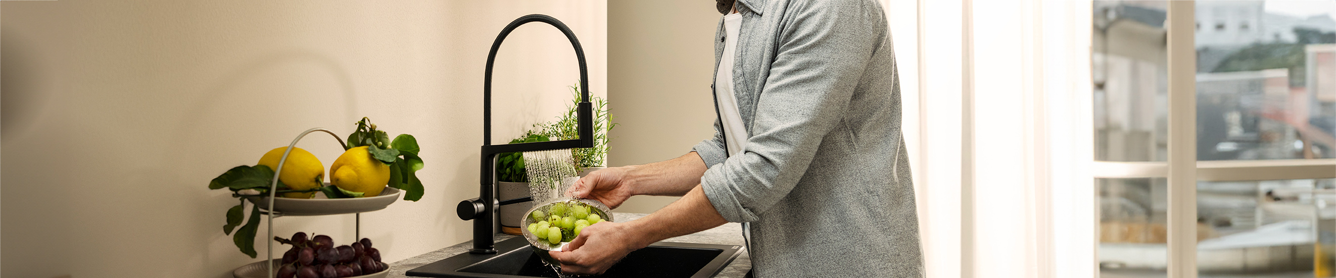 The Talis Select M54 PowderSpray helps with kitchen chores.