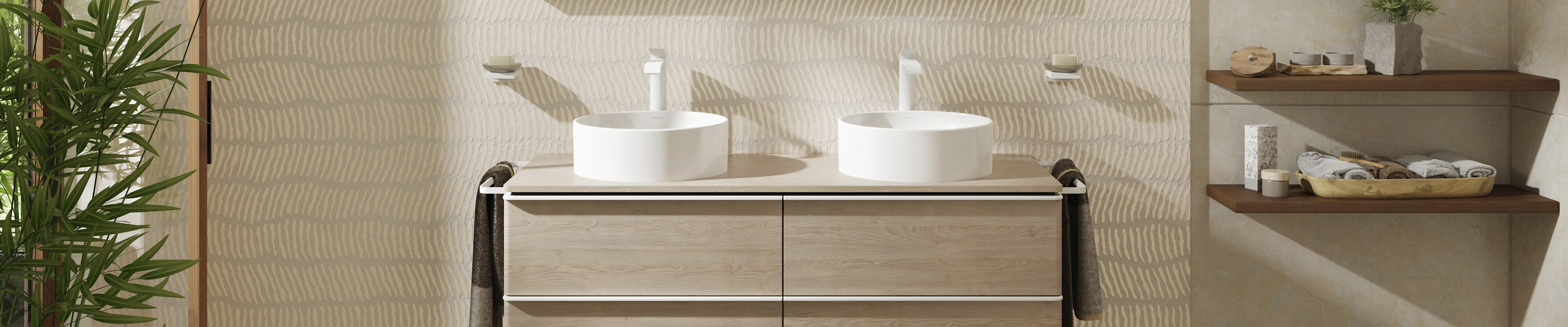 Round Xuniva countertop sink on Xelu Q bathroom furniture.